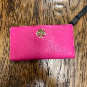 Kate Spade pink wallet.
